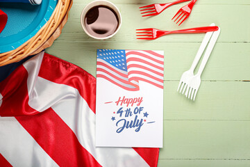 Fototapeta na wymiar Greeting card for Independence Day and American flag with picnic basket on table