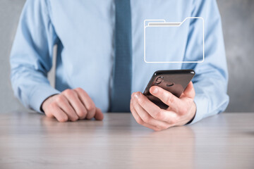 Businessman hold folder icon.Document Management System or DMS setup by IT consultant with modern...
