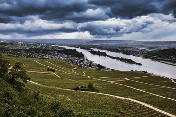 Threatening storm clouds over the river Rhine and the small town of Rüdesheim