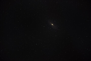 Stars in the night sky. Amateur photo of Andromeda galaxy.