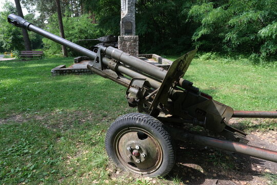 Turosn Koscielna, Poland - July 14, 2021: Memorial 26st Infantry Regiment LWP (Ludowe Wojsko Polskie). A T-34/85 tank and a 76 mm M1942 field gun (ZiS-3) are placed on both sides of the memorial.