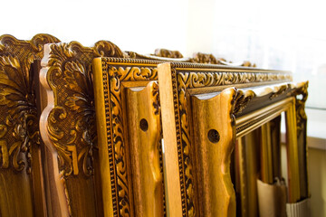 detail wooden carved frames gold color classical style in the store