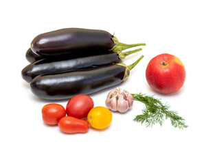 Eggplants, tomatoes, garlic on the table on a white background. Set about cooking a delicious...