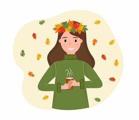Autumn girl. Girl in wreath with cup of hot drink.