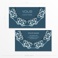 Business cards in Blue with luxurious light patterns. Business card design with vintage ornament.