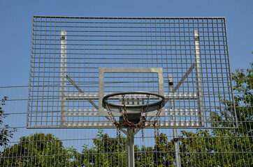 multifunctional outdoor playground for ball games at school. green artificial turf from a plastic...