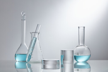 Stage showcase cosmetics on glass pedestal modern in laboratory equipment. Laboratory glass...