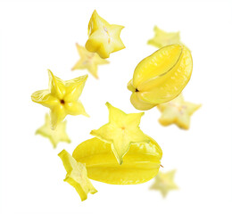 Fototapeta premium Tasty juicy carambolas flying on white background