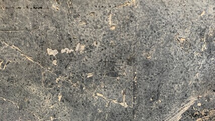 texture of black cement background   There are peeling marks of paint.  and cracks in the walls 