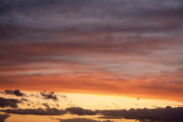 Fototapeta na wymiar Cloudscape of cumulus sunset clouds with sunlight