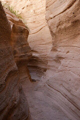 Tent Rock National Monument.
Spectacular narrow tunnel between the high rocks composed of pumice.