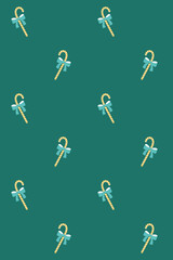 Christmas candy canes and bows seamless pattern. Winter holidays festive design. For greeting card, textile, banner, wrapping paper, textile, background, wallpaper.