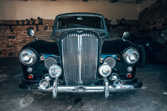 Riga, Latvia. June 10, 2021. Old vintage retro car parked in the garage. Rools Royce classic.