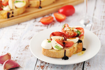 Italian bruschetta with tomatoes and mozzarella