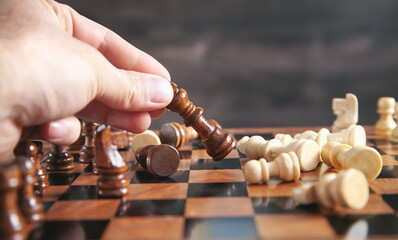 Man playing chess. Competition strategy concept