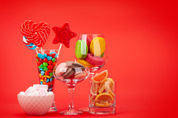 Various sweets in cocktail glasses