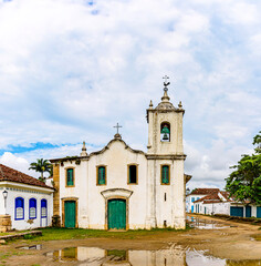 Fototapeta na wymiar Front view of a historic church in the ancient city of Paraty on the coast of the state of Rio de Janeiro