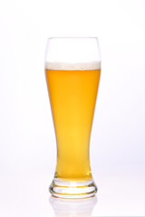 Glass of light beer on a white background.
