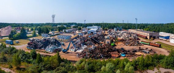 Scrap Yard With Pile Of Crushed Cars. Old damaged cars on the junkyard waiting for recycling
