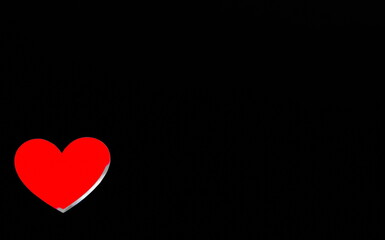 one red heart on a black background