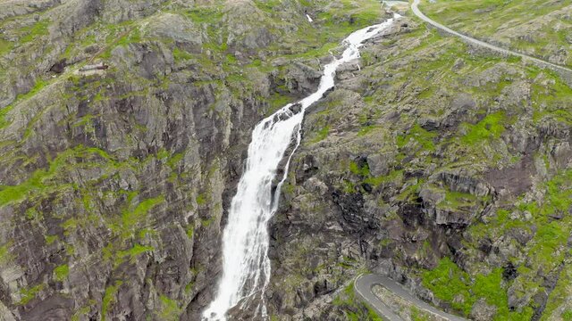 Aerial View Of Stigfossen Waterfall At The Rocky Cliff In More Og Romsdal County, Norway. 