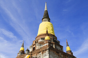 Naklejka premium Beautiful view of the ancient pagoda of Watyaichaimongkhon in Ayutthaya Province, Thailand. Beautiful temple landscape of Ayutthaya Historical park, public domain