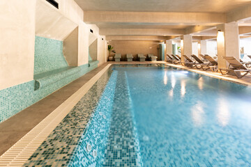 Indoor swimming pool in hotel spa and wellness center