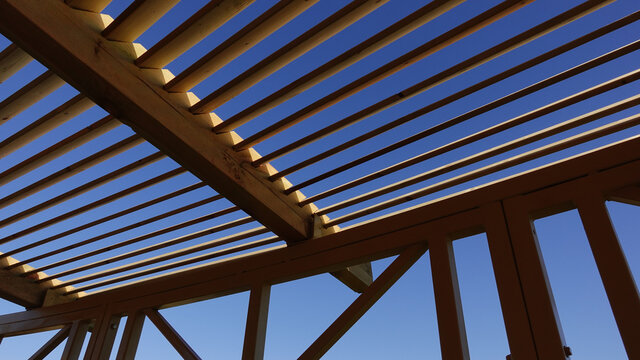 Low Angle View Of Wood Material Structure Against Sky