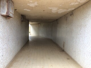 Darkened outdoor corridor