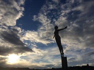 silhouette of a person in the sky