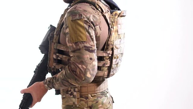 Man in bulletproof vest and war belt