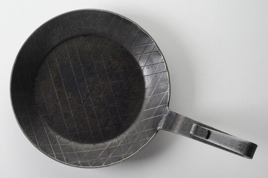 Forged Metal Frying Pan On White Background