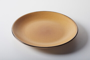Minimalist style brown plate on table