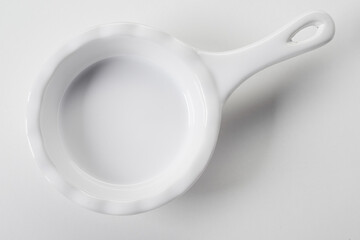 White ceramic bakeware with handle