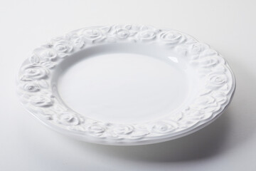 White dinner plate with floral pattern