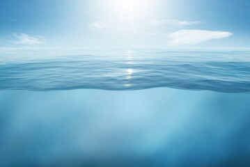 Blue sea or ocean water surface and underwater with sunny and cloudy sky - 448811845