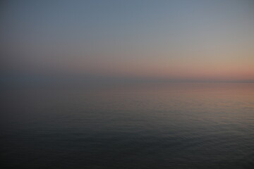 Naklejka na ściany i meble beautiful sunrise early morning sun on the seaside