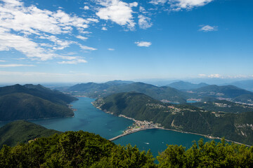 Gorgeous view from the hill top at Balcony of Italy, over Lake Lugano, city Lugano and other cities. The view go far into Switzerland, all to the way to the Swiss alps. Shot from the Italian side of t