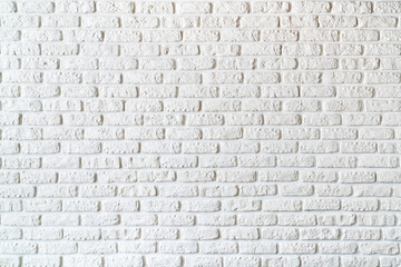 White painted bricks on the wall decoration for background.