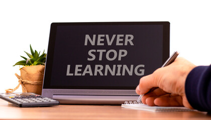 Never stop learning symbol. Tablet with words 'Never stop learning'. Businessman holds pen, house...