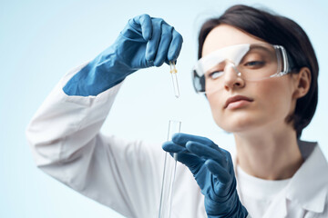 Fototapeta premium female scientist in white coat research laboratory Professional