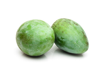 Organic fresh raw mango fruit close up on isolated white background