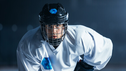 Ice Hockey Arena: Portrait of Confident and Concentrated Professional Player, Wearing Wire Cage...