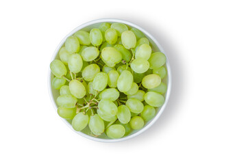 Green grape. Ripe berries in a white plate. Isolated on white.