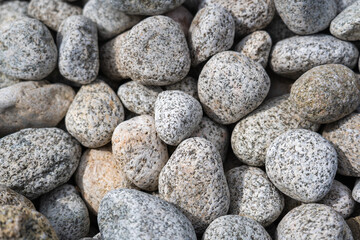 Fototapeta na wymiar Gray Granite Large Pebbles Background