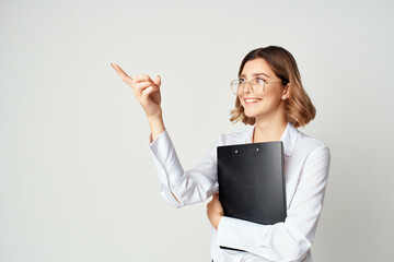 cheerful woman manager in white shirt documents work professional