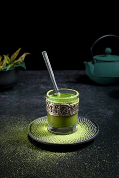 Glass with green matcha tea