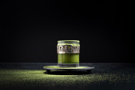 Glass cup with matcha tea
