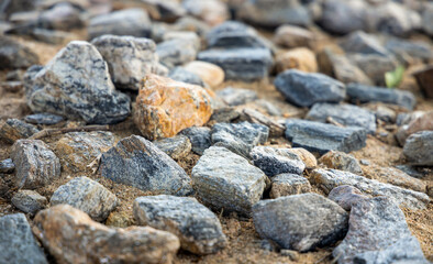 Soft focus of broken stones lying on the ground