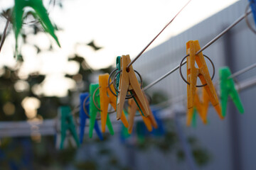 Multiple and colored clothes-pins On the street